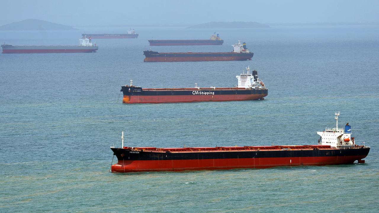 Ships moored off Hay Point waiting to be loaded with coal. Mr Dick’s budget revealed a staggering $15.2bn haul from coal royalties.