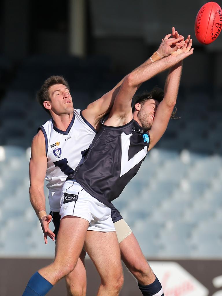 Vic Country’s Sam Michael and VAFA’s Antony Forato at Ikon Park, Carlton. Picture: Yuri Kouzmin