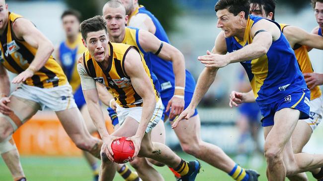 Box Hill’s James Cousins runs away from Willimsstown’s Joel Tippett Picture: Michael Dodge (Getty Images)