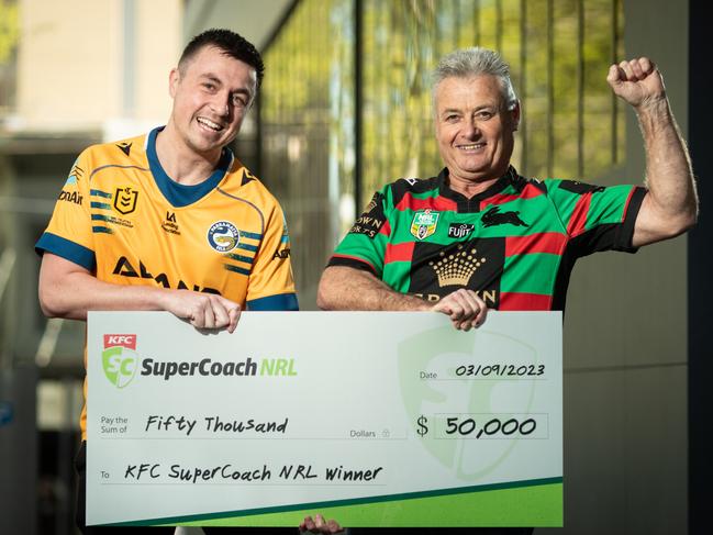 06/09/23. The DailyTelegraph, News.Surry Hills, Sydney, NSW, Australia.Portraits of Wayne Hartas, 62, from West Hoxton in Sydney, with his $50,000 cheque he won as KFC SuperCoach champion. Wayne is pictured with his mate Alex Smith who persuaded him to enter the comp.Picture: Julian Andrews