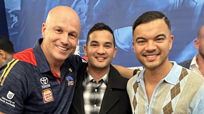 Crows coach Matthew Nicks with Guy Sebastian (right) and Guy's brother, Jeremy Sebastian (centre). Picture: James Hetherington/Adelaide Football Club