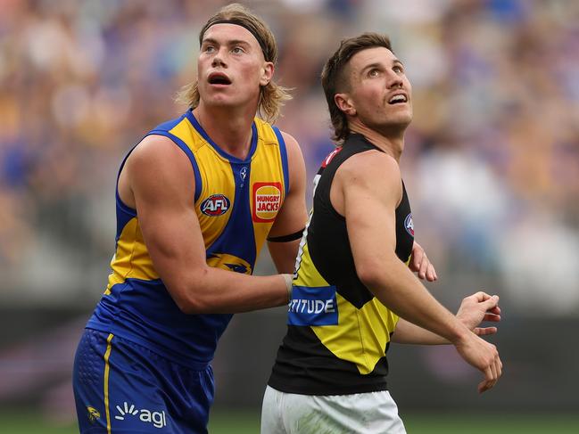 PERTH, AUSTRALIA - APRIL 14: Harley Reid of the Eagles defends Liam Baker of the Tigers during the 2024 AFL Round 05 match between the West Coast Eagles and the Richmond Tigers at Optus Stadium on April 14, 2024 in Perth, Australia. (Photo by Will Russell/AFL Photos via Getty Images)