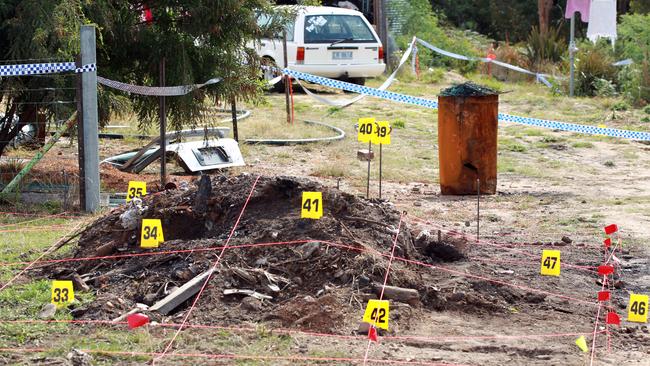 Police markings for evidence in the investigation into the death of Brendon Marriott.