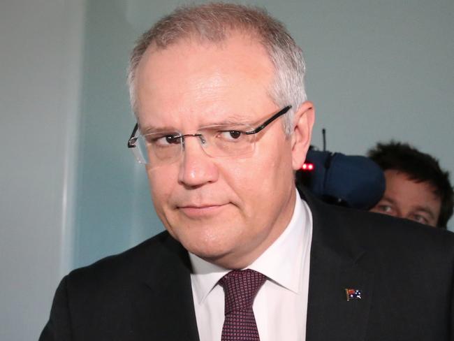 Treasurer Scott Morrison leaves Ch9 studios at Parliament House in Canberra this morning after being interviewed by Laurie Oaks. Picture: Ray Strange.