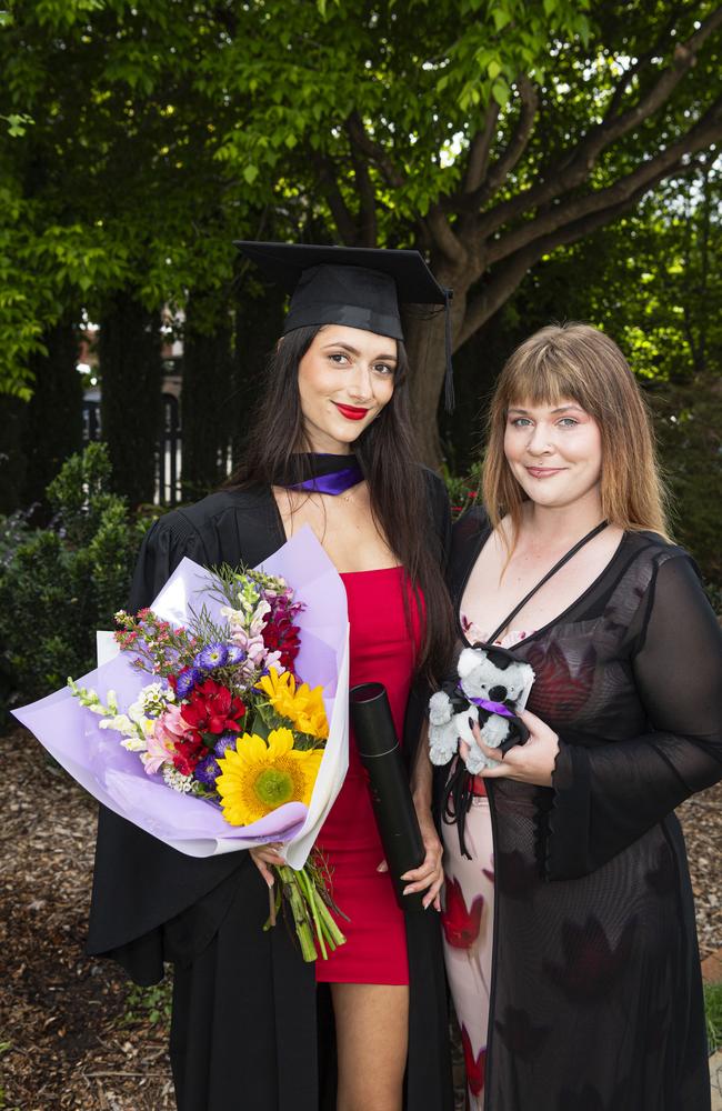 Bachelor of Laws graduate Jazmine Cowling celebrates with sister Jemma Strange at a UniSQ graduation ceremony at The Empire, Wednesday, October 30, 2024. Picture: Kevin Farmer