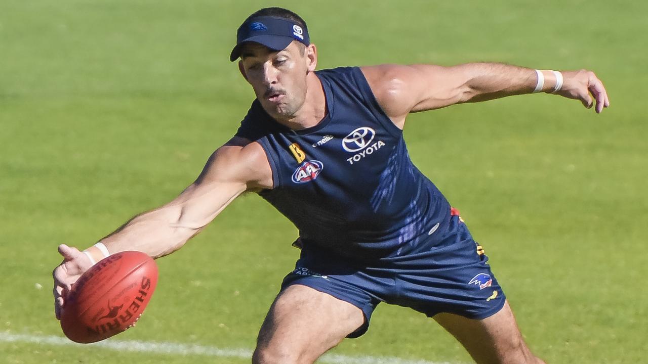 Taylor Walker stretches for the ball at Crows training. Picture: Roy VanDerVegt