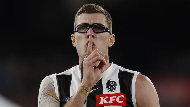 MELBOURNE , AUSTRALIA. May 3, 2024.  AFL. Carlton vs Collingwood at the MCG. Shhhh.  Mason Cox of the Magpies gestures towards the crowd after kicking a 2nd qtr goal    . Pic: Michael Klein