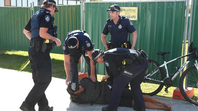 Police making an arrest in Surfers Paradise. Picture Mike Batterham