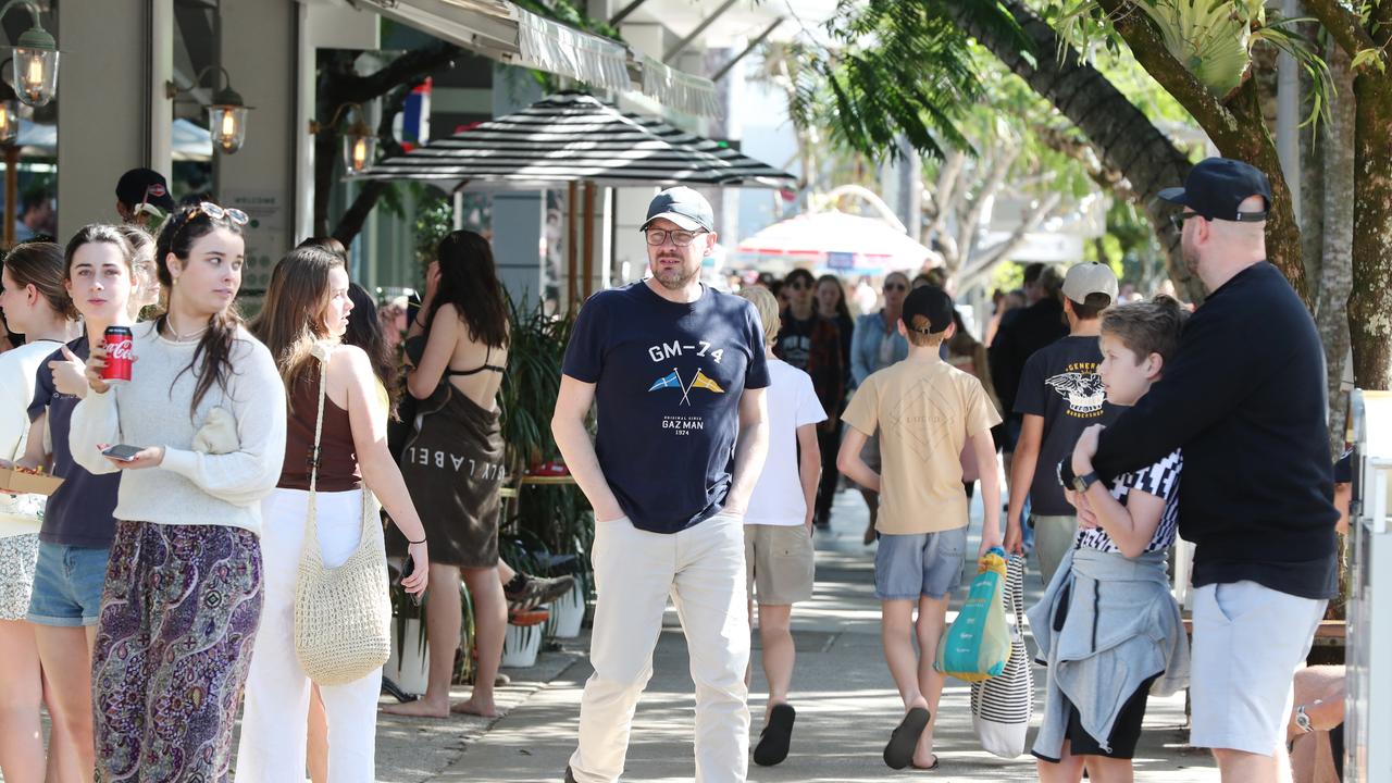 Holidaymakers on Hastings Street in Noosa. Picture: Lachie Millard