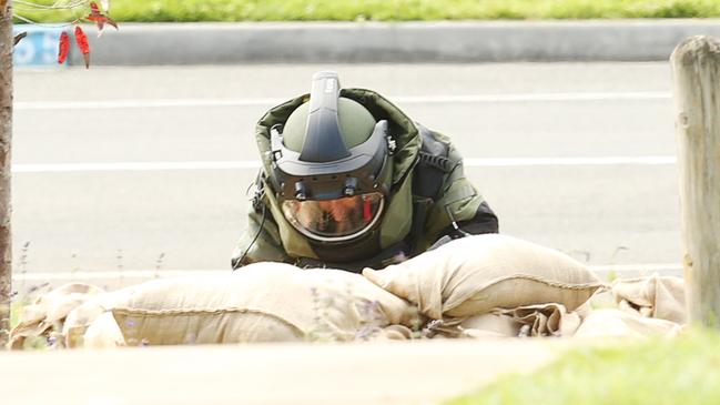 The bomb squad laid sandbags at the scene. Picture: Alan Barber