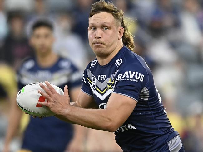 TOWNSVILLE, AUSTRALIA - JUNE 08: Reuben Cotter of the Cowboys runs the ball during the round 14 NRL match between North Queensland Cowboys and New Zealand Warriors at Qld Country Bank Stadium, on June 08, 2024, in Townsville, Australia. (Photo by Ian Hitchcock/Getty Images)