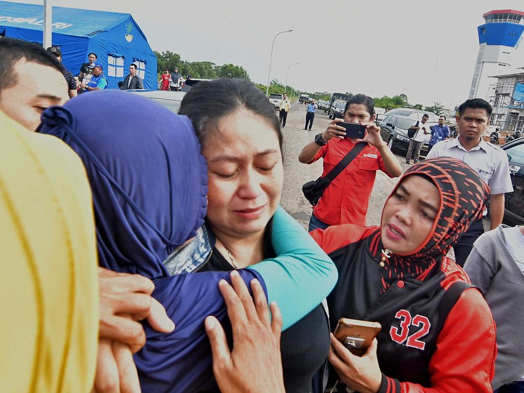 Putri lost her  husband and child in the horrific crash. Picture:  AFP)