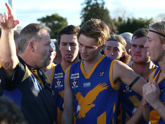 Somerville coach Brad Canavan addresses his players. Picture: David Crosling