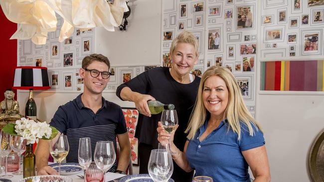 Owner Kate Madison serving wine to James McFarlane and Mary Gerrard. Picture: Jerad Williams