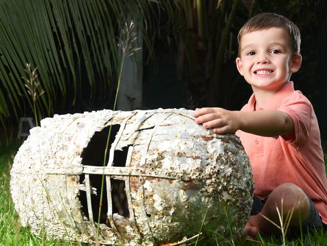 Kai Humbles (4) found an oxygen tank from a B17 Bomber on Lee Point Beach.