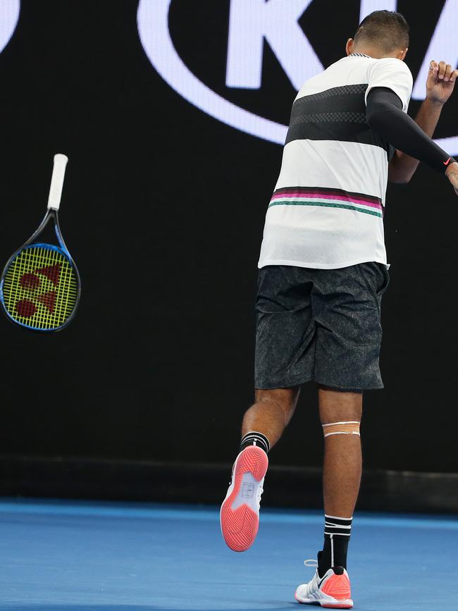 Nick Kyrgios throws his racquet in frustration. Picture: Michael Klein