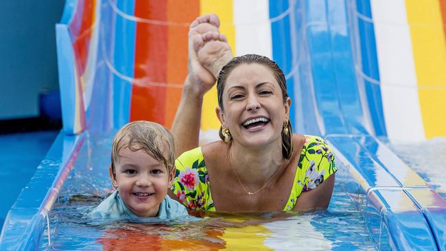 Liz Cantor and her son Kit, 3, checking out the waterslides at Helensvale’s Big 4 Park. Picture: Jerad Williams