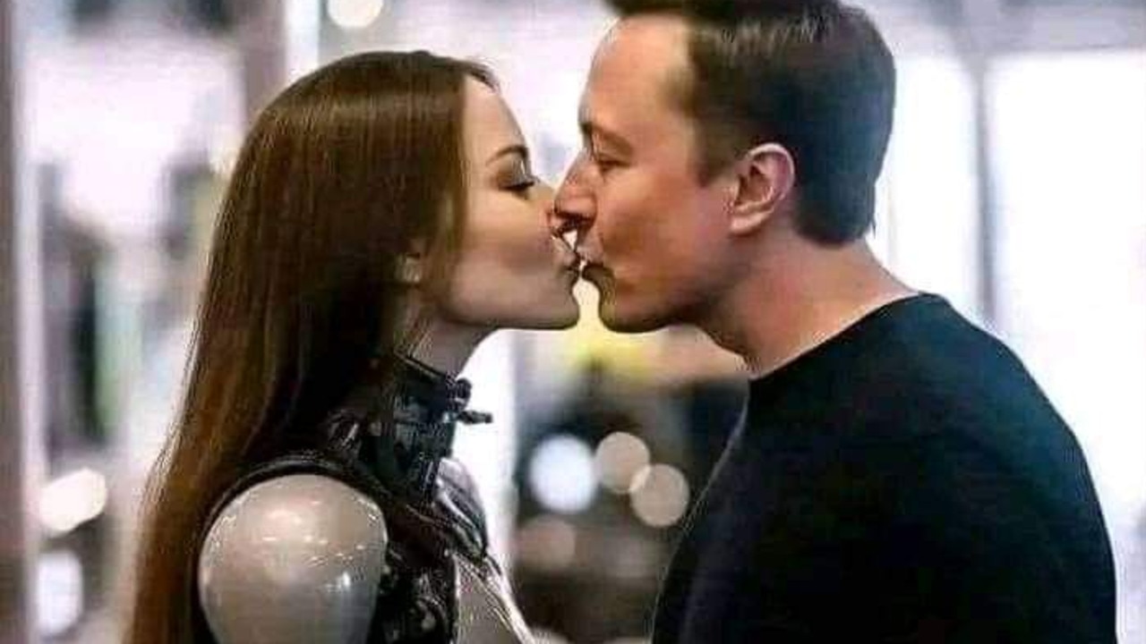 Bizarre photo of Elon Musk kissing robot baffles internet news.au — Australias leading news site picture
