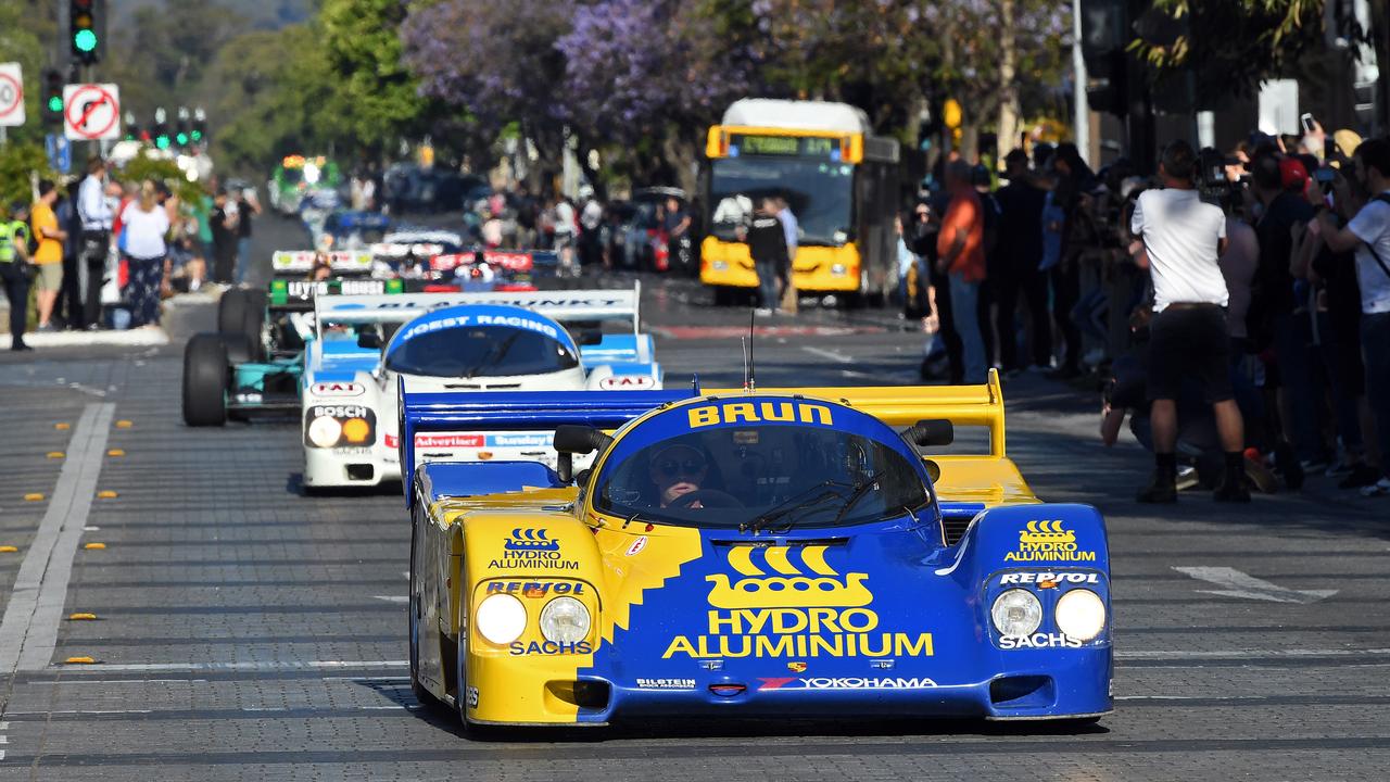 Race cars head down Wakefield Street through Victoria Square for the Adelaide Motorsport Festival’s Peak Hour of Power. Picture: Tom Huntley