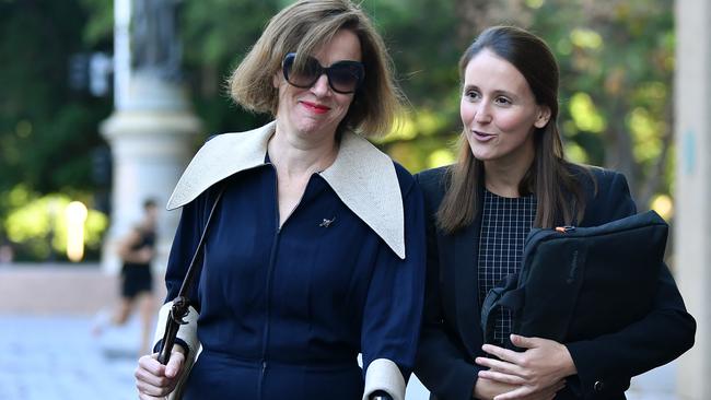 Jo Dyer (left) leaves the Supreme Court in Sydney with her lawyer during the case involving Christian Porter. Picture: NCA NewsWire/Joel Carrett