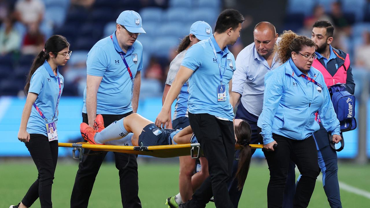 Natalie Tobin is stretchered from the field during the round one of the 2023 season. Picture: Mark Metcalfe/Getty Images