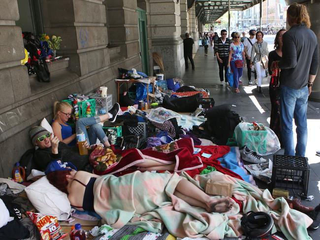 Homeless people sleeping rough on Flinders St in Melbourne this week. Picture: David Crosling