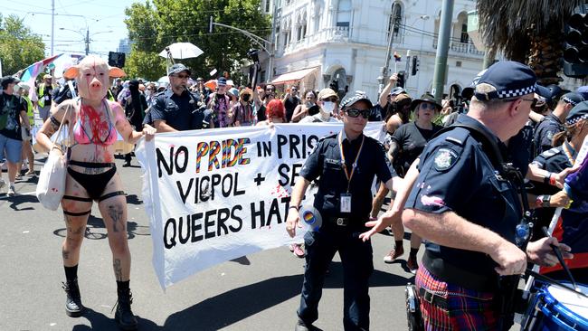 A small group of protesters clash with police who were marching in the Midsumma Pride Parade along Fitzroy Street St Kilda. Picture: Andrew Henshaw