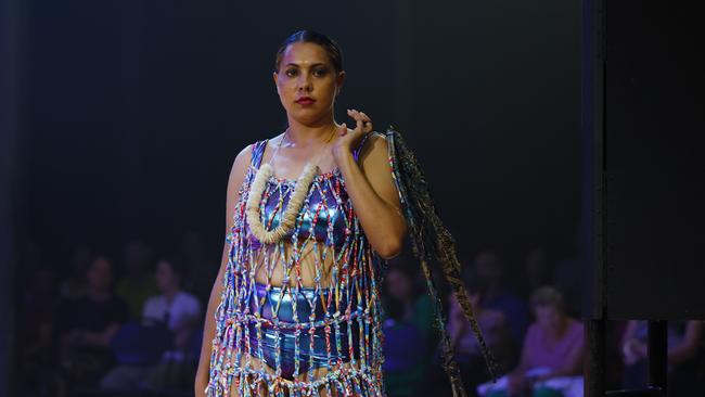 A model showcases the Taking Shape collection from designer Elverina Johnson at the Cairns Indigenous Art Fair fashion performance, Woven, held at the Tanks Arts Centre, Edge Hill. Picture: Brendan Radke