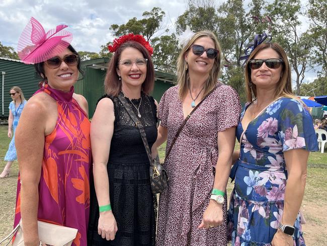 Nicole Bowie, Michelle Smith, Katrina Pokarier and Lilett Prichard enjoying the Torbanlea Picnic Races.