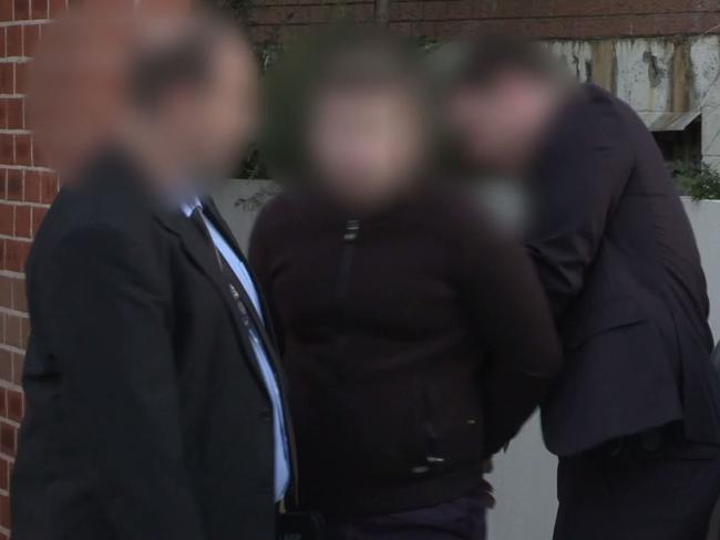 Adam Cranston is arrested at his Bondi home. Picture: Police Media