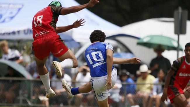 High-flyers in the under 14 boys Tonga v Samoa match.