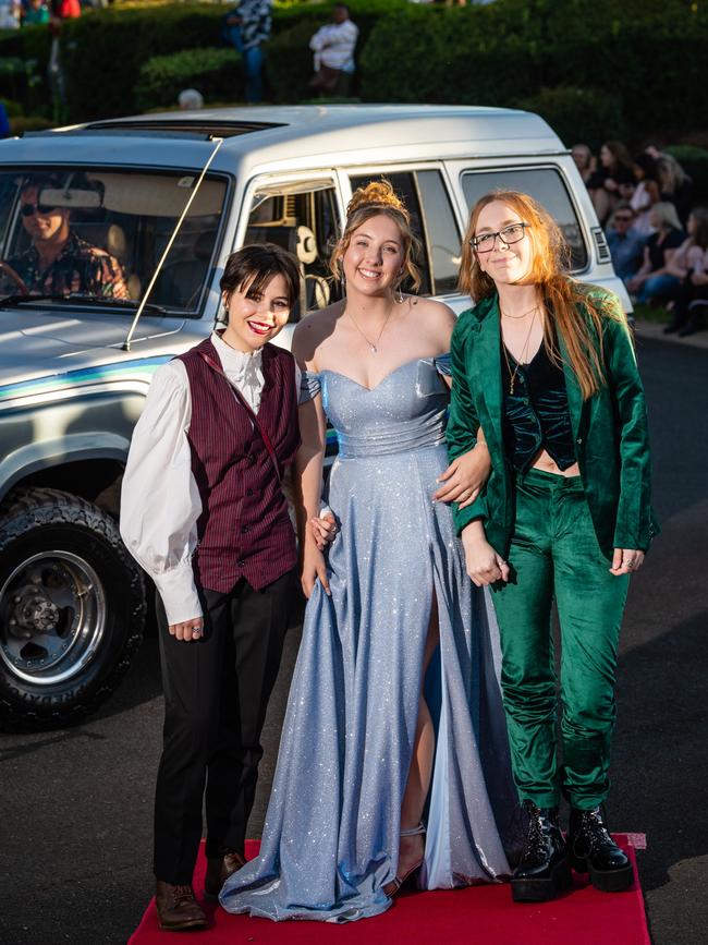 Arriving at Harristown State High School formal are (from left) Fatimah Clifford-Pugh, Erin Ryan and Madison Brown at Highfields Cultural Centre, Friday, November 18, 2022. Picture: Kevin Farmer