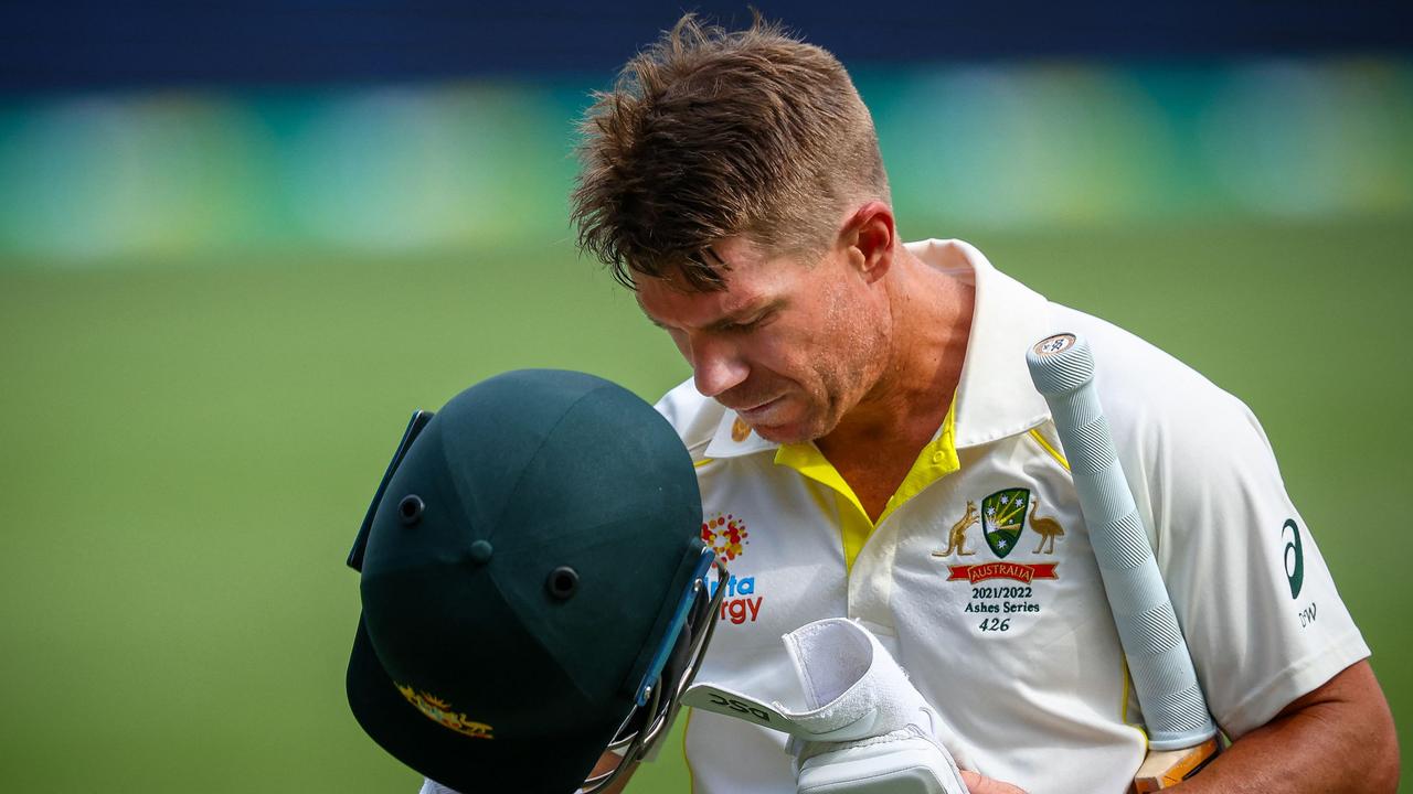 Australia’s David Warner departs for 94. Photo by Patrick HAMILTON / AFP