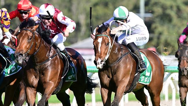 Call Da Vinci (right), ridden by apprentice jockey Jaden Lloyd, wins the Sacred Elix 2YO Handicap at Ipswich on Wednesday. Picture: Grant Peters/Trackside Photography