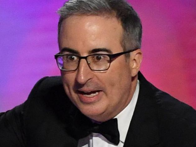 British-US comedian John Oliver accepts the Outstanding Scripted Variety Series award for âLast Week Tonight with John Oliverâ onstage during the 76th Emmy Awards at the Peacock Theatre at L.A. Live in Los Angeles on September 15, 2024. (Photo by VALERIE MACON / AFP)