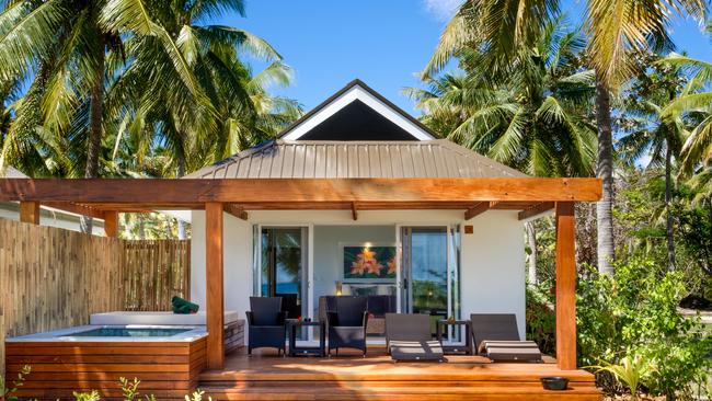 One of the 30 white-painted bures on Lomani Island Resort.