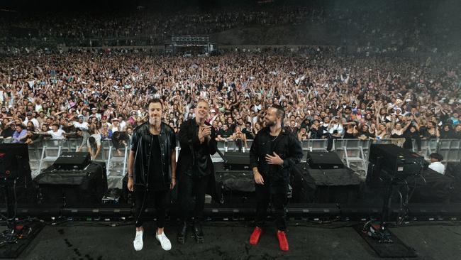 Sydney alternative dance act Rufus Du Sol at The Gorge Amphitheatre in Washington, US in October, before it was nominated for two awards at the 2023 Grammys. L-R: James Hunt, Tyrone Lindqvist, and Jon George. Picture: Michael Drummond