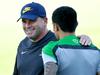 Socceroos coach Ange Postecoglou talks with Tim Cahill during Socceroos training at No. 2 Sports Ground,Newcastle .Picture Gregg Porteous