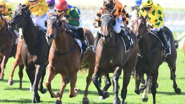 Miss Kindilan (orange/black silks) appreciated the extra room at Eagle Farm. Picture: Grant Peters, Trackside Photography