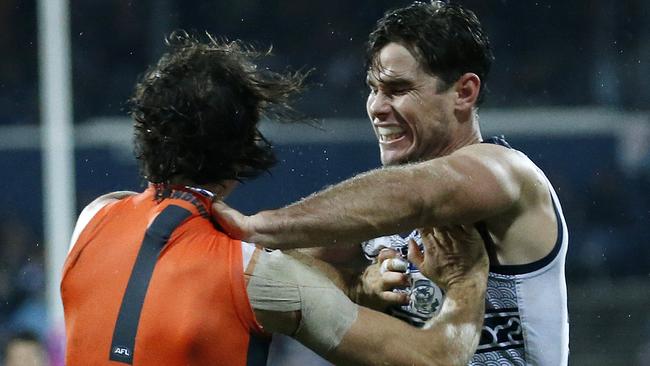 Hawkins copped a week for this stoush with GWS defender Phil Davis last year. Picture: George Salpigtidis