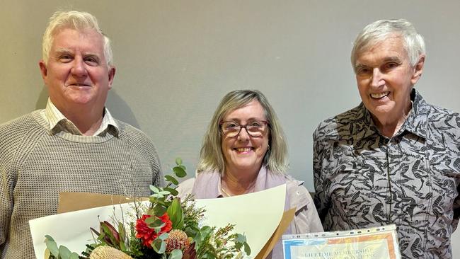 Brian Anker, Lyn Saxton and Brian Raison (inaugural President of Development Watch) presenting her lifetime membership award as recognition of her service to Development Watch and the community.