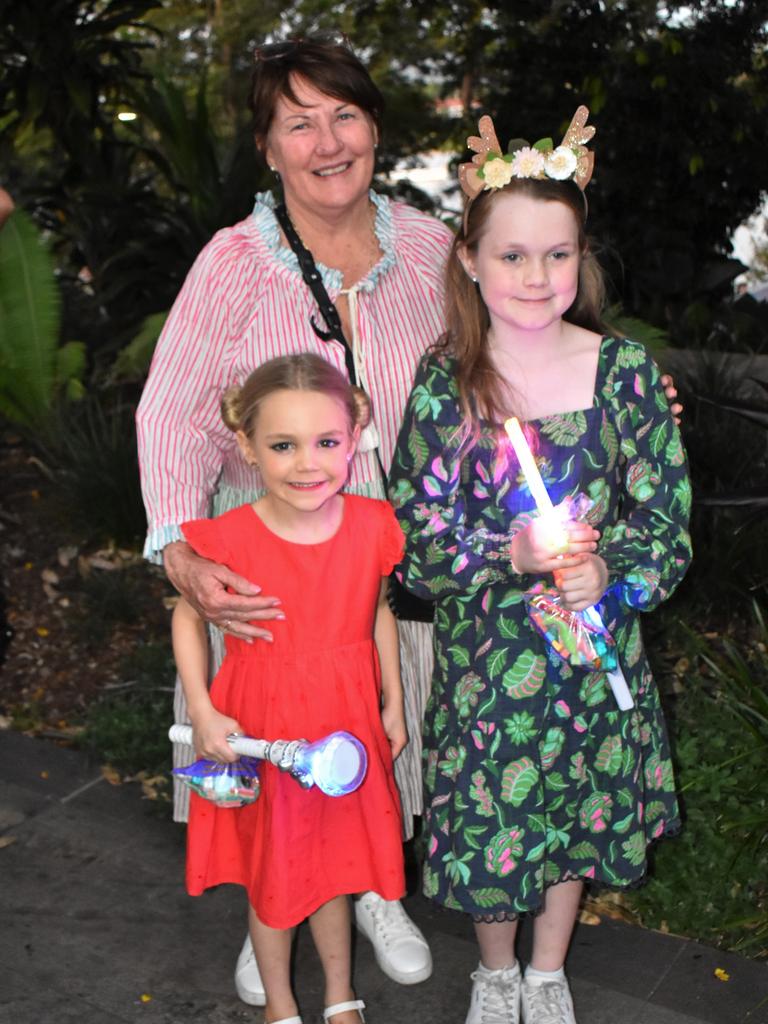 Barb, Abigail and Grace Carne at the CBD Christmas Fair in Rockhampton on December 3, 2022.