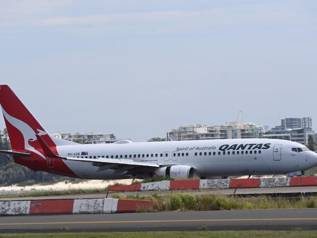 Qantas flight QF144 arrives at Sydney Airport after a mayday alert was called. Picture: Jeremy Piper