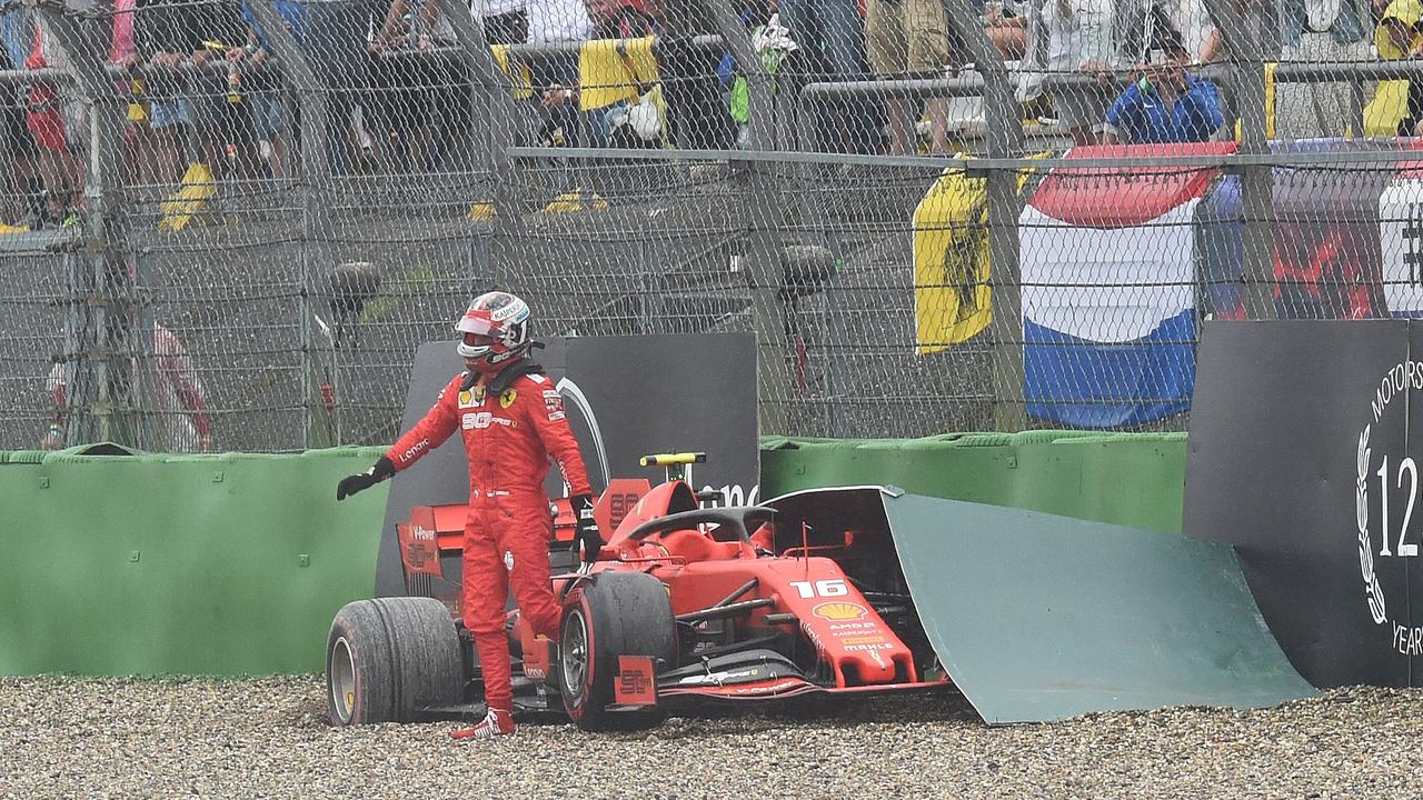 Charles Leclerc gets out of his car after crashing during the German Grand Prix.