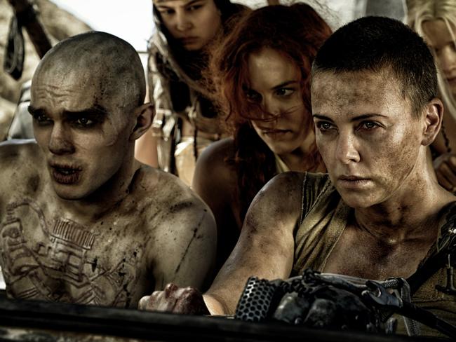 This photo provided by Warner Bros. Pictures shows, from left, Nicholas Hoult as Nux, Courtney Eaton as Fragile, Riley Keough as Capable, Charlize Theron, as Imperator Furiosa, and Abbey Lee Kershaw as Wag, in Warner Bros. Pictures’ and Village Roadshow Pictures’ action adventure film, “Mad Max:Fury Road," a Warner Bros. Pictures release. (Jasin Boland/Warner Bros. Pictures via AP)