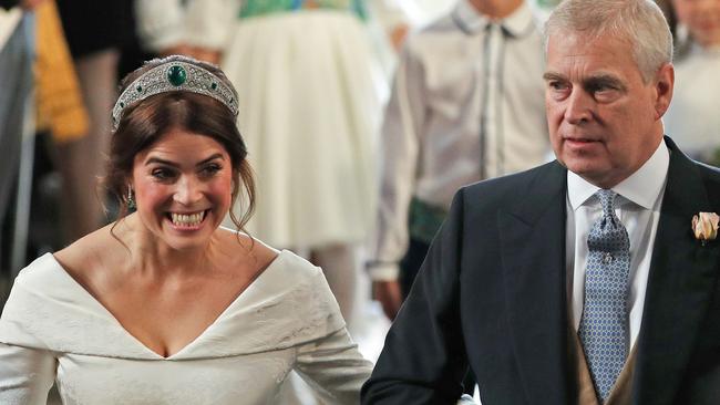 Prince Andrew walks daughter Princess Eugenie down the aisle during her wedding. Picture: Yui Mok/AFP