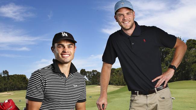 Port Adelaide players Karl Amon and new recruit Jack Watts at Kooyonga Golf Club this week. Picture: Sarah Reed.