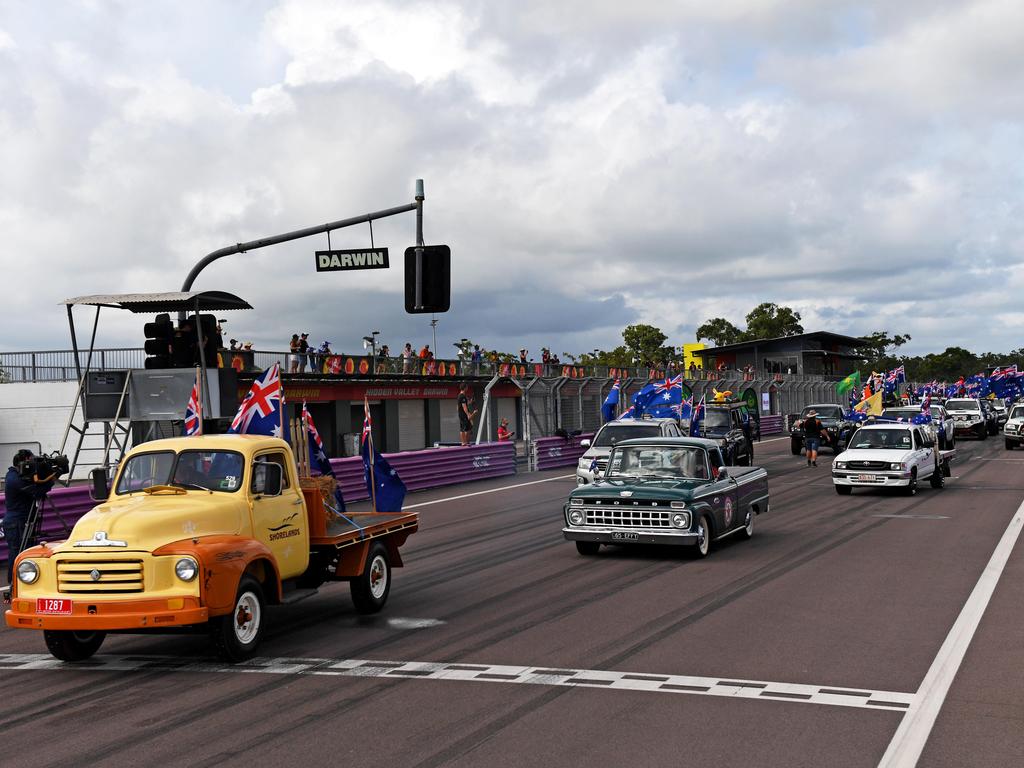 And they're off. Dozens of utes hit the road at Hidden Valley for the annual Variety NT Australia Day Ute run. Picture: Che Chorley