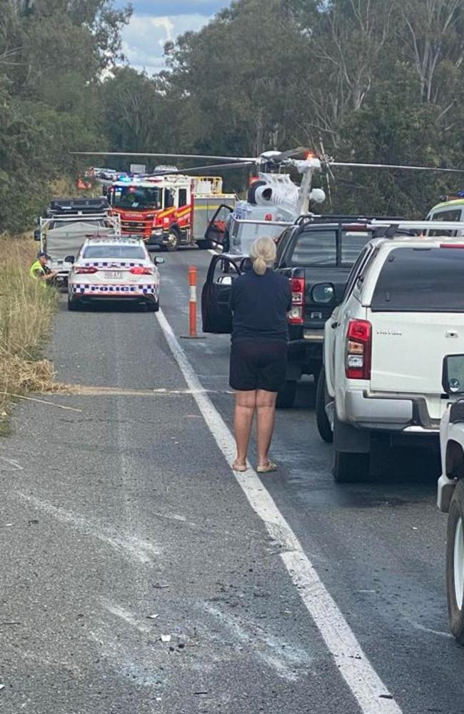 A desperate rescue is underway after a man was trapped in a car, which crashed 10m down an embankment on the Bruce Hwy north of Gympie. Picture: Benny James Strong