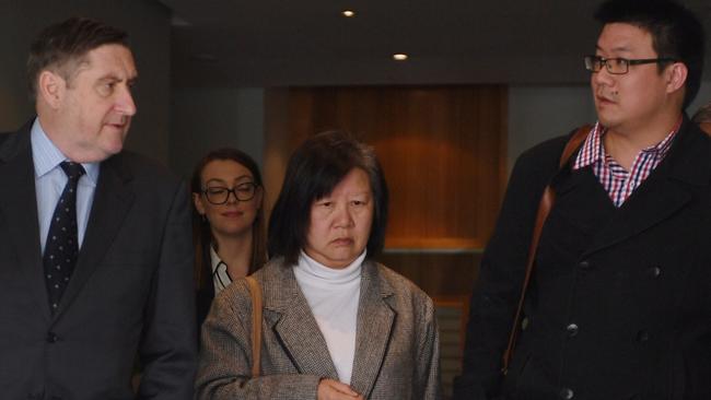 The family of Samuel Seeto and their lawyer (left) of leave the Glebe State Coroners Court in Sydney. Picture: AAP